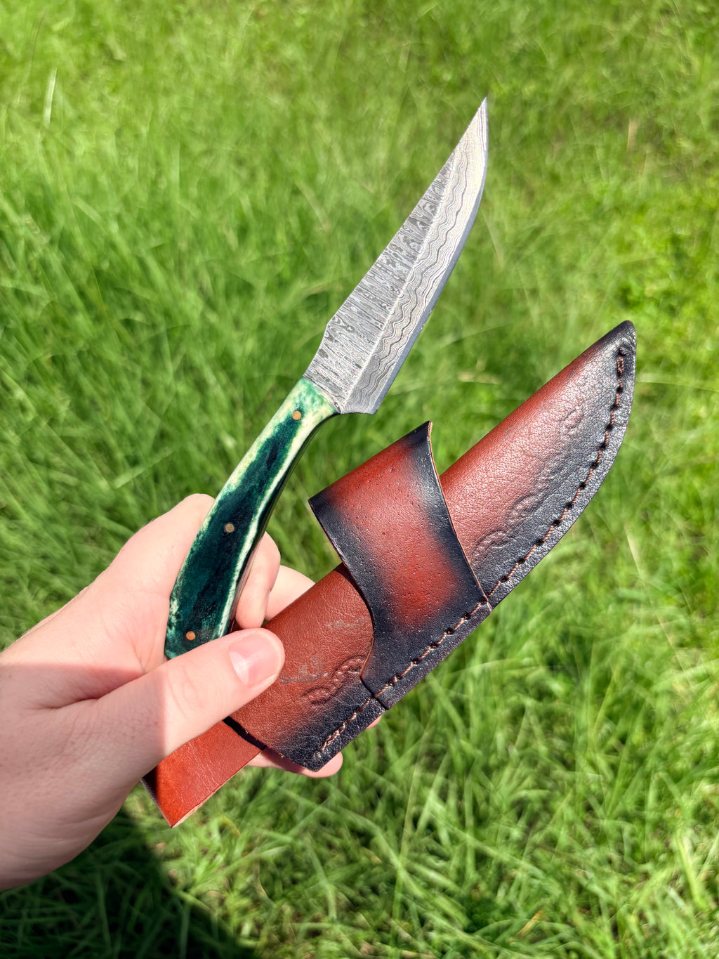 Damascus Trailing Point Fixed Blade (sheath included)